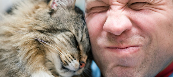 man and cat with silly faces